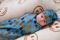 Load image into Gallery viewer, Caught in the Rain (Pineapple) Swaddle
